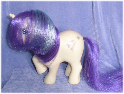 white unicorn
          with shooting star symbol